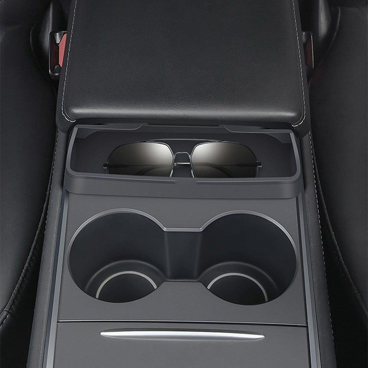 Car Glasses Case in car center console holding sunglasses for organized storage.