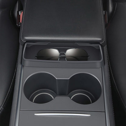 Car Glasses Case in car center console holding sunglasses for organized storage.