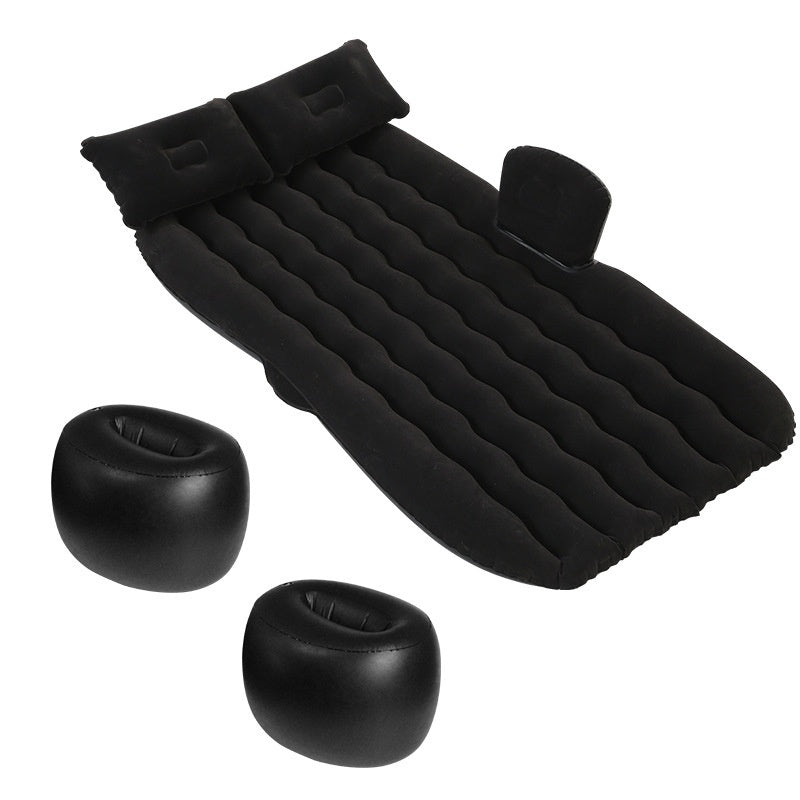 Wave-Shaped Inflatable Car Bed with two inflatable pillows and head support for travel comfort.
